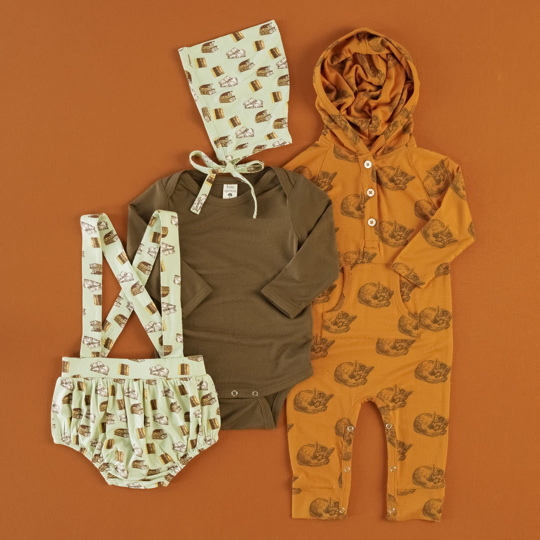 books + teak sleeping fox set