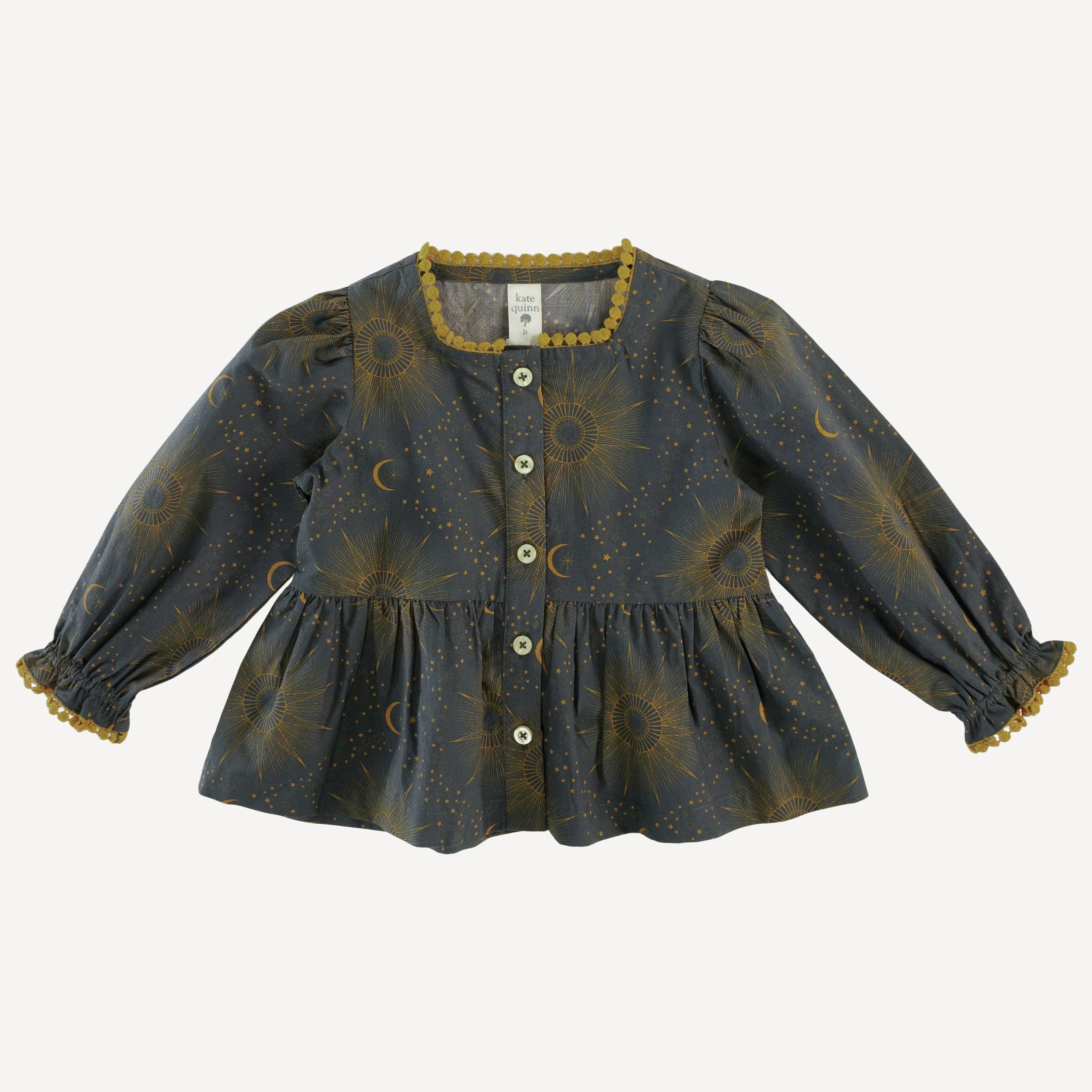 long sleeve gathered waist pom pom top eye in the sky organic cott