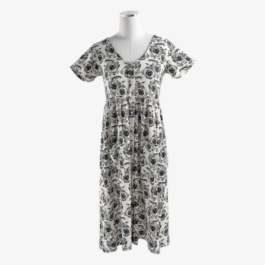 womens v-neck pocket button dress | onyx peace on earth | raw edge organic cotton