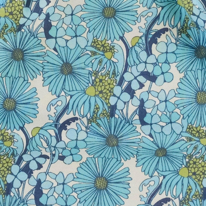 long sleeve peter pan apron top | aqua 70s daisy | organic cotton interlock