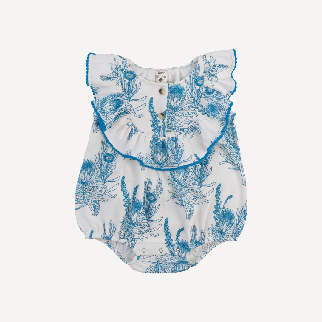 sleeveless ruffle button pom pom bubble | blue proteas | organic cotton interlock