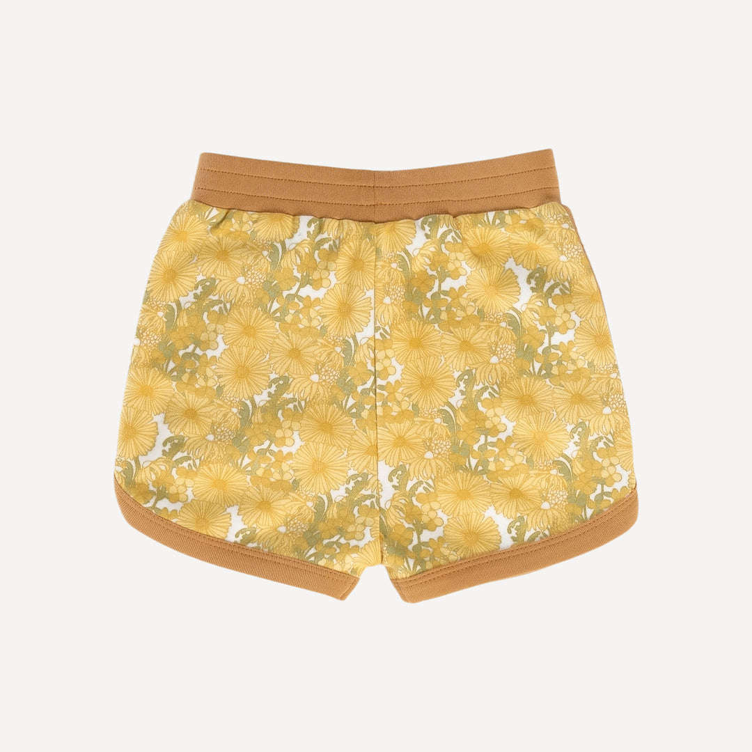 ringer track pocket short | 70s yellow bold daisy | organic cotton interlock
