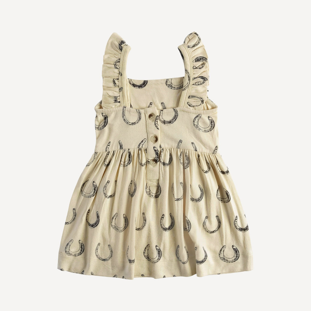 sleeveless pinafore ruffle dress | horse shoes | organic cotton jersey
