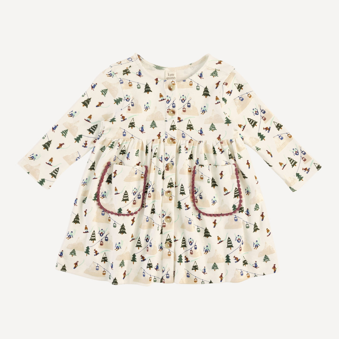 long sleeve pinafore apron pom pom pocket dress | ski village | bamboo
