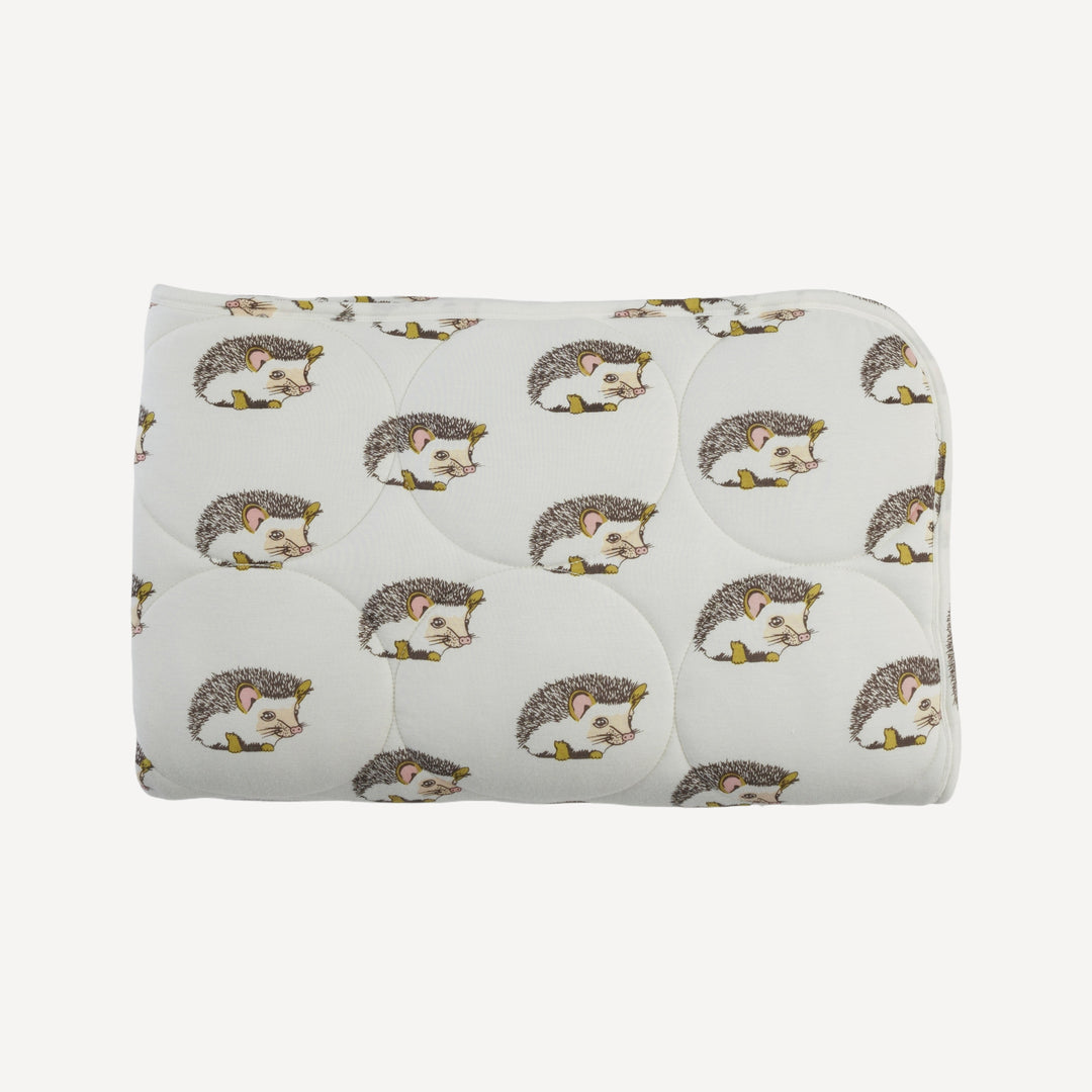 classic circle quilt | gold hedgehogs | bamboo