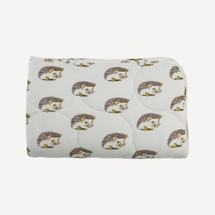 classic circle quilt | gold hedgehogs | bamboo