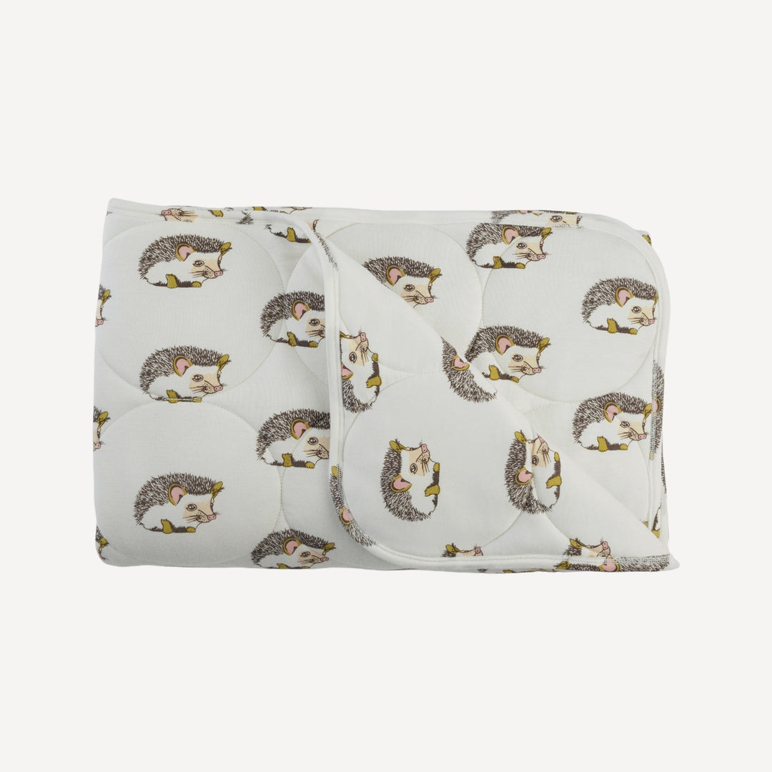 classic circle quilt | gold hedgehogs | bamboo