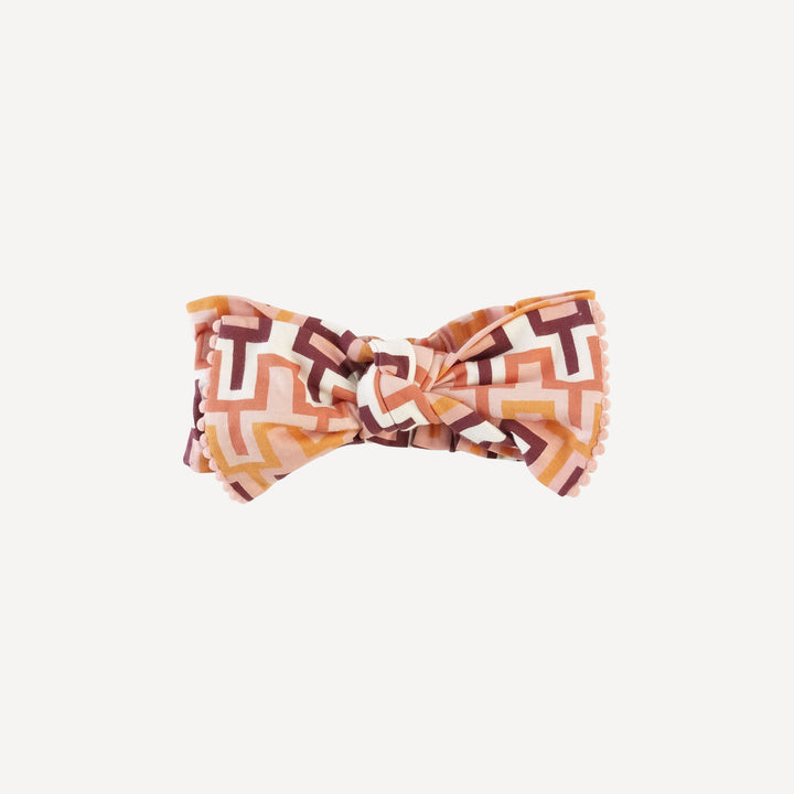 large pom pom bow elastic headband | peach taffy graphic | organic cotton jersey