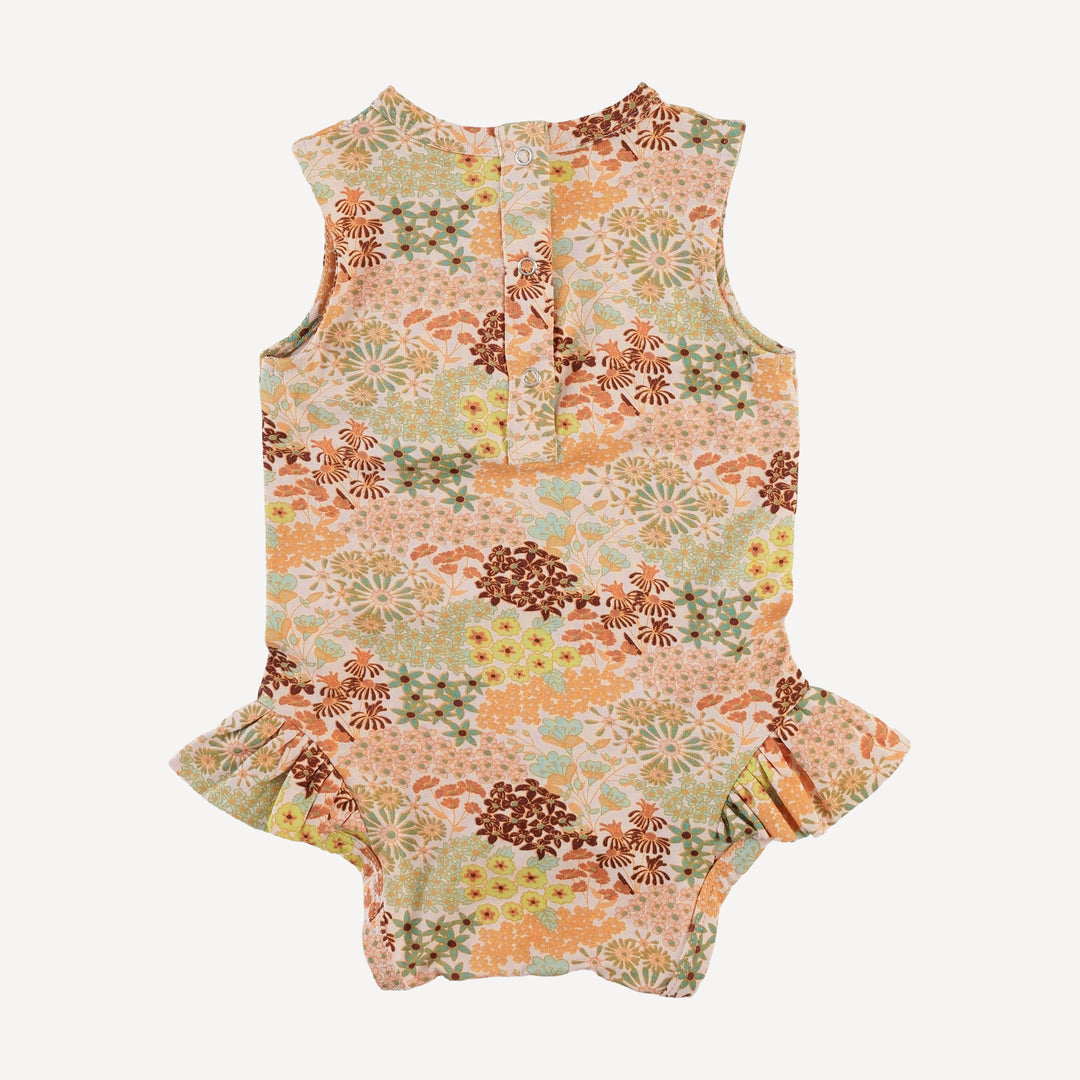 sleeveless ruffle leg bodysuit | pink ditsy garden | bamboo
