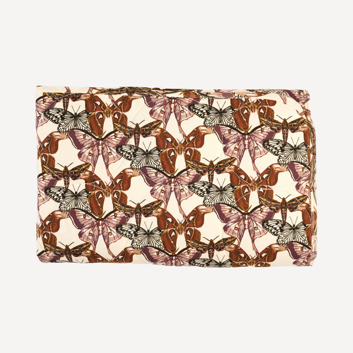 classic circle quilt | moth wallpaper | organic cotton interlock