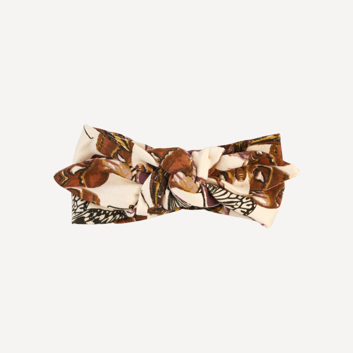 knot top elastic headband | moth wallpaper | organic cotton interlock