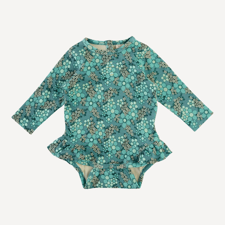 long sleeve ruffle leg bodysuit | aqua granny floral | organic cotton interlock