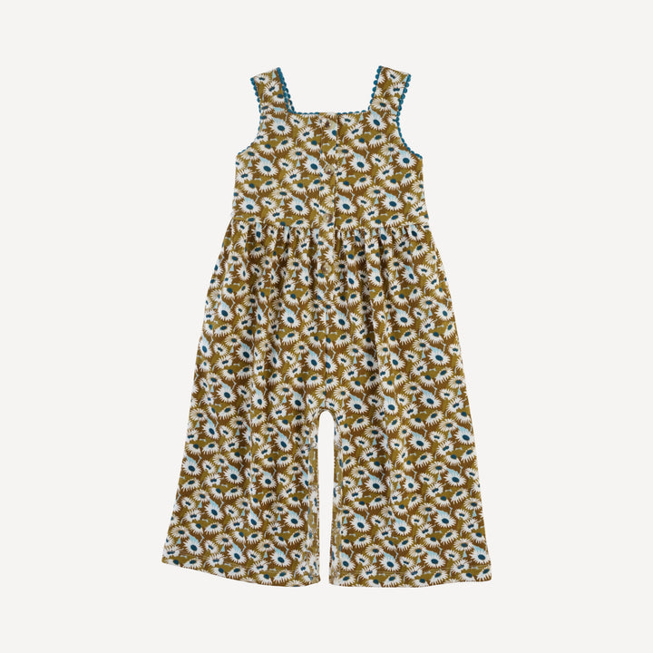 sleeveless gathered waist pom pom gaucho jumpsuit | blue daisy garden | organic cotton interlock