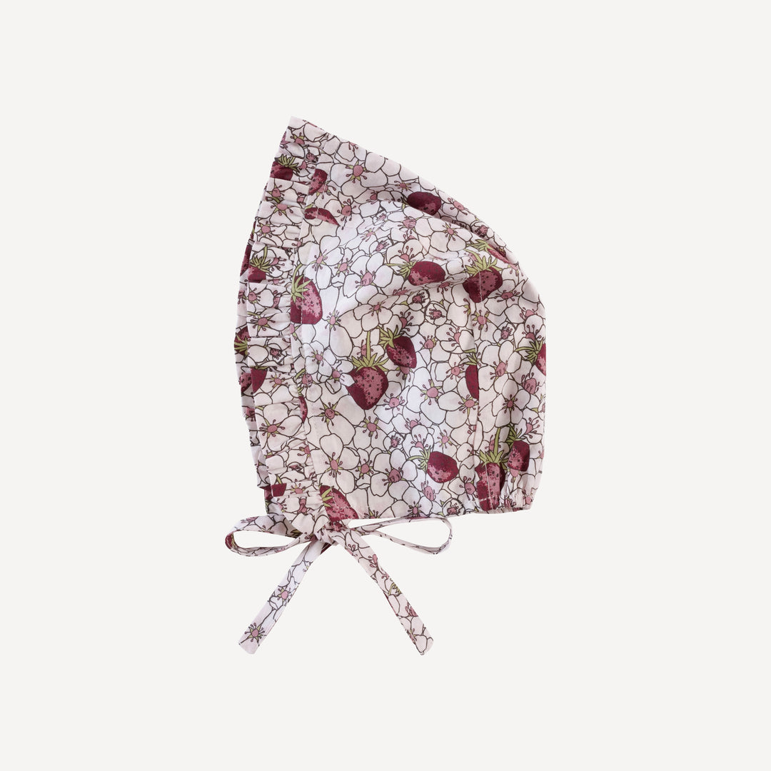 small ruffle bonnet | pink strawberry floral | organic cotton mid-weight woven