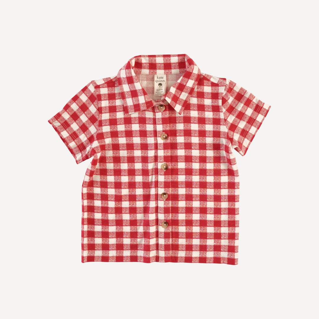 short sleeve button down shirt | red checked tablecloth | bamboo