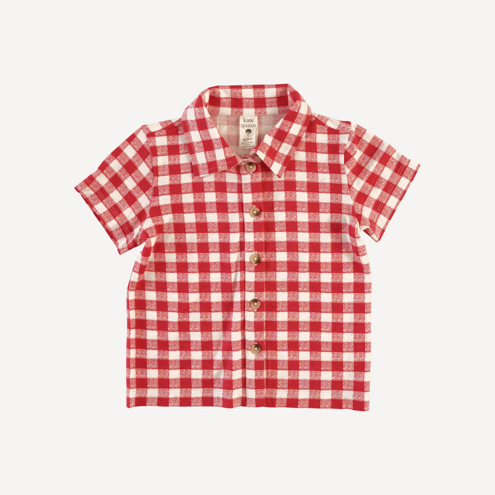 short sleeve button down shirt | red checked tablecloth | bamboo