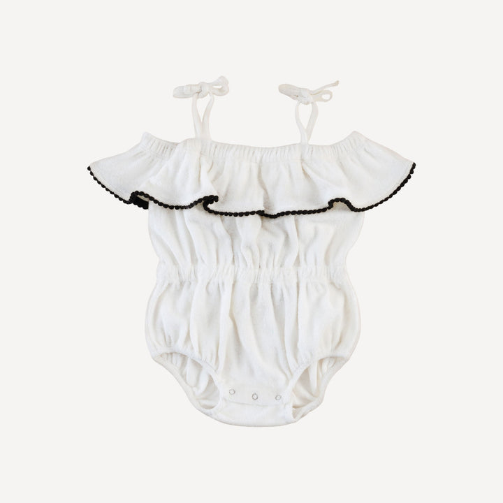 spaghetti tie ruffle off shoulder bubble with pom poms | coconut | organic cotton terry