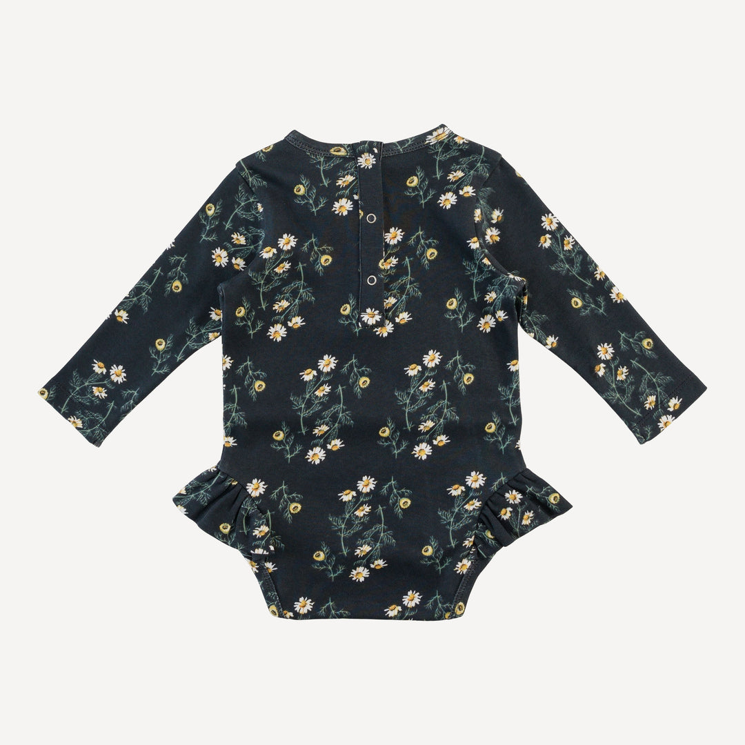 long sleeve ruffle leg bodysuit | black chamomile | organic cotton interlock