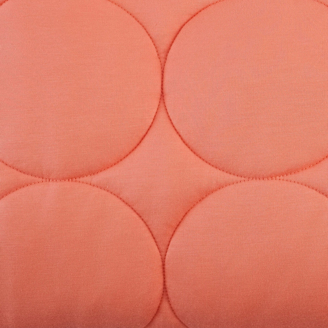 classic circle quilt | peach sorbet | bamboo