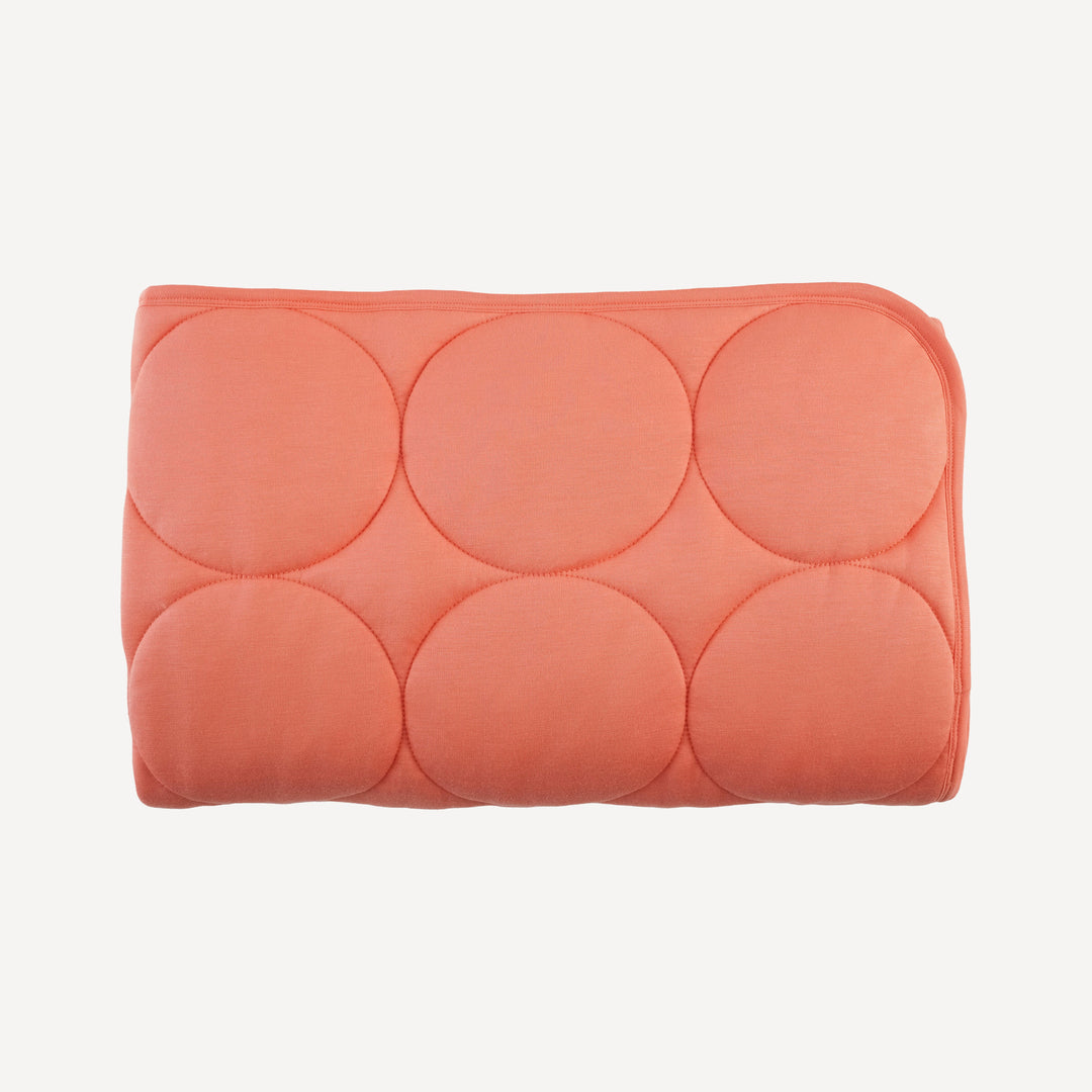 classic circle quilt | peach sorbet | bamboo