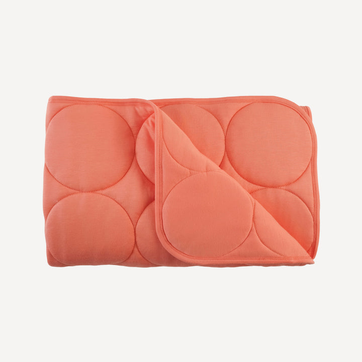 classic circle quilt | peach sorbet | bamboo