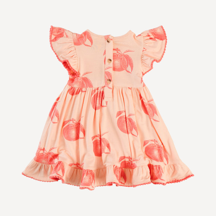 flutter sleeve pom pom pinafore dress | vintage peaches | bamboo