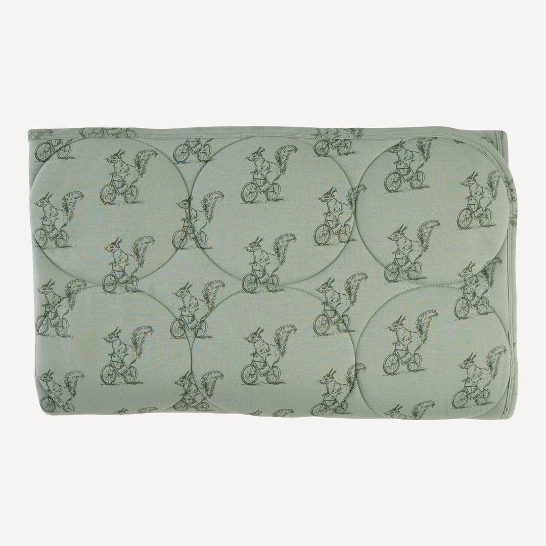 classic circle quilt | squirrels on bike | organic cotton interlock
