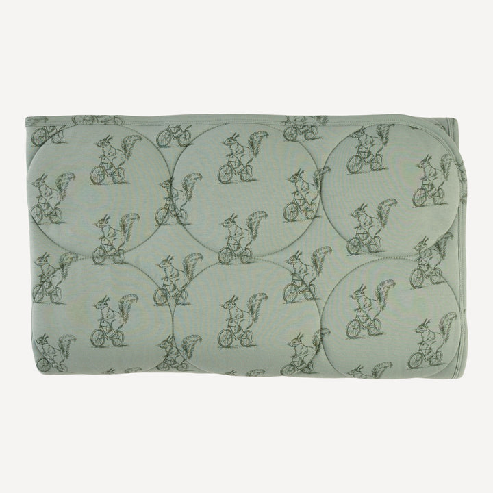 classic circle quilt | squirrels on bike | organic cotton interlock