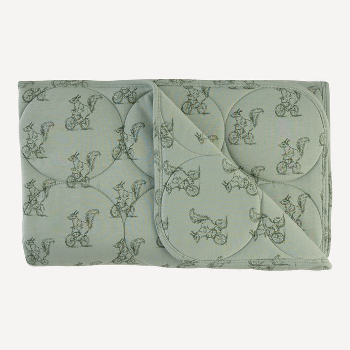classic circle quilt | squirrels on bike | organic cotton interlock