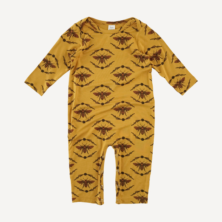 long sleeve lap neck jumpsuit | golden floral bee | bamboo