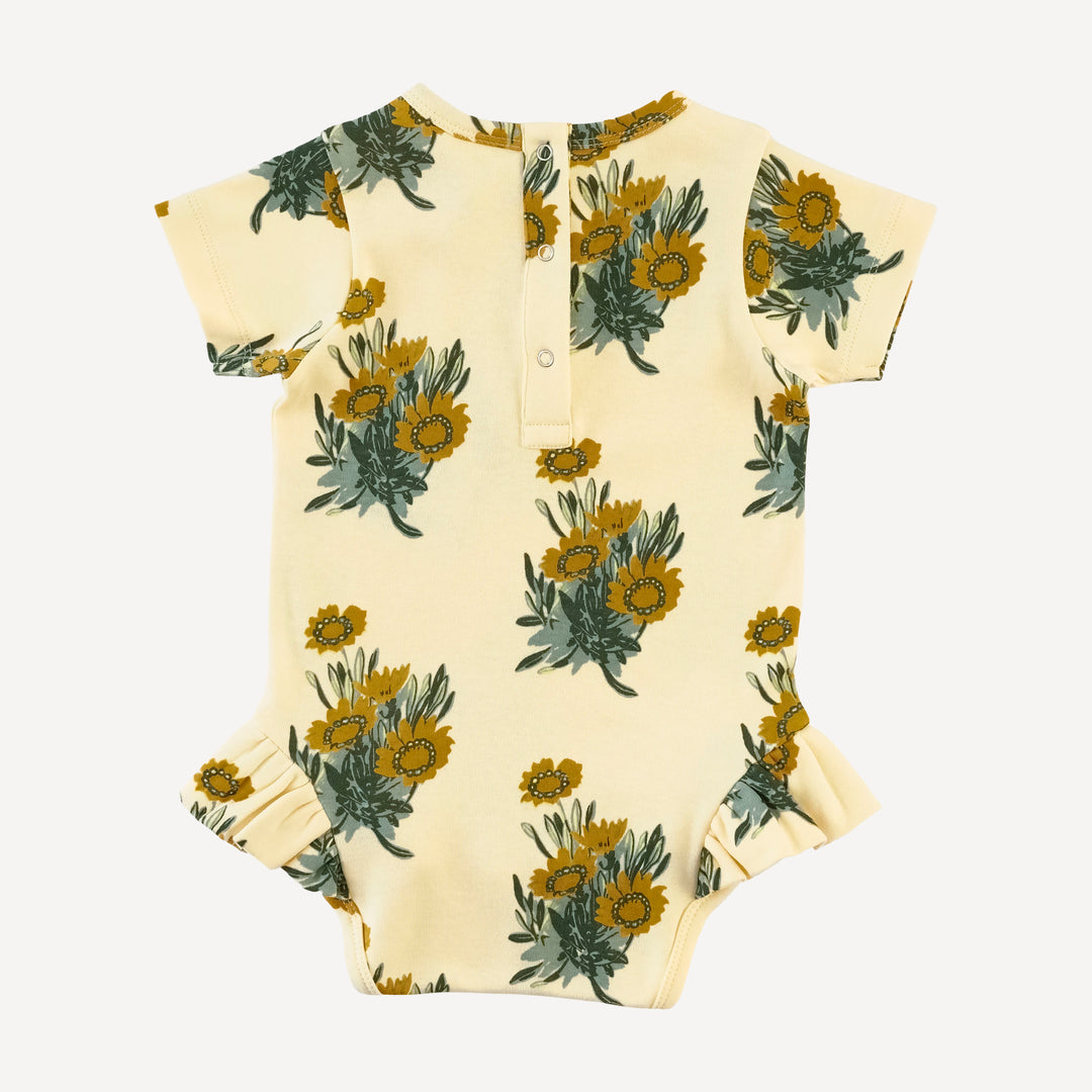 short sleeve ruffle leg bodysuit | calendula | organic cotton interlock