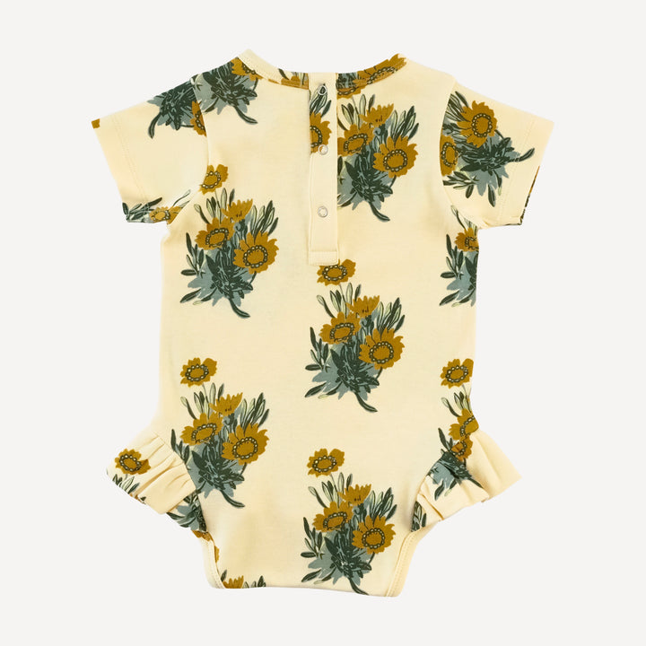 short sleeve ruffle leg bodysuit | calendula | organic cotton interlock