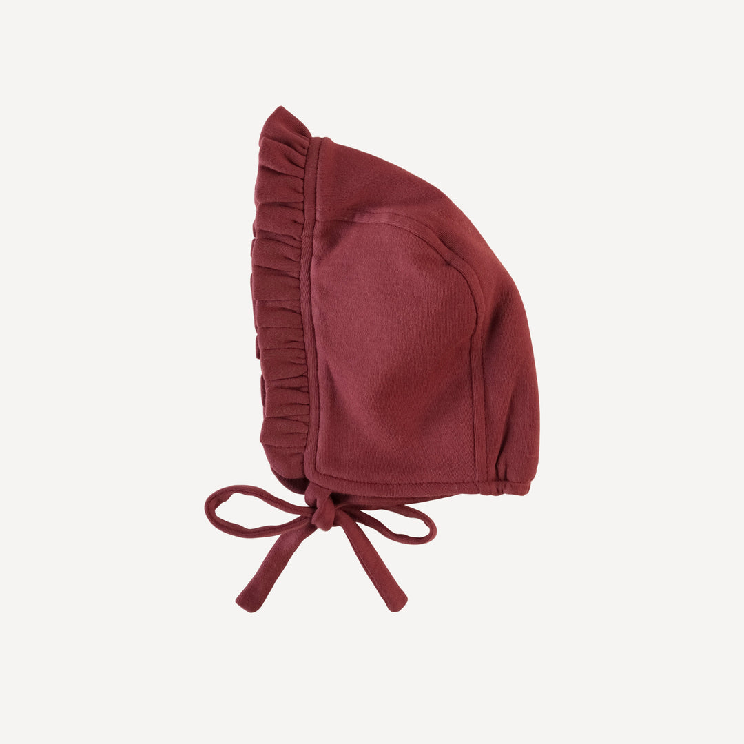 small ruffle bonnet | bordeaux | organic cotton interlock