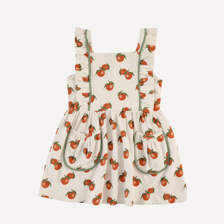piped pinafore ruffle dress | clementine | organic cotton interlock