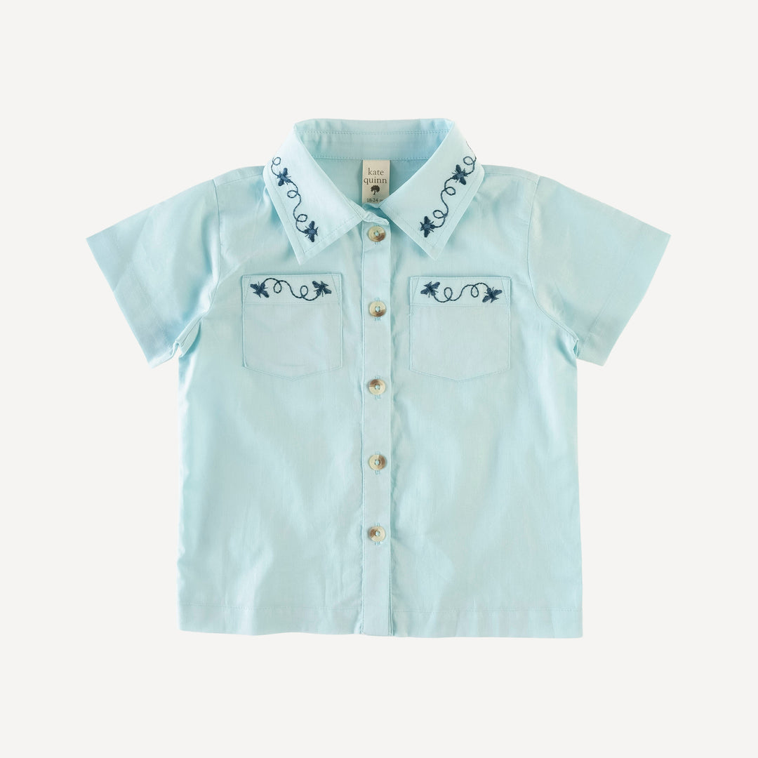 short sleeve embroidered button shirt | glow blue | organic cotton woven