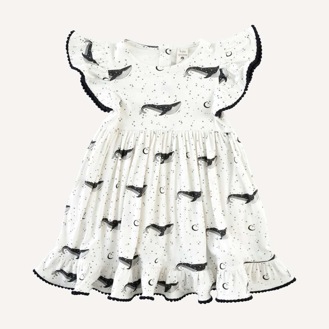 flutter sleeve pom pom pinafore dress | mystical whales | bamboo
