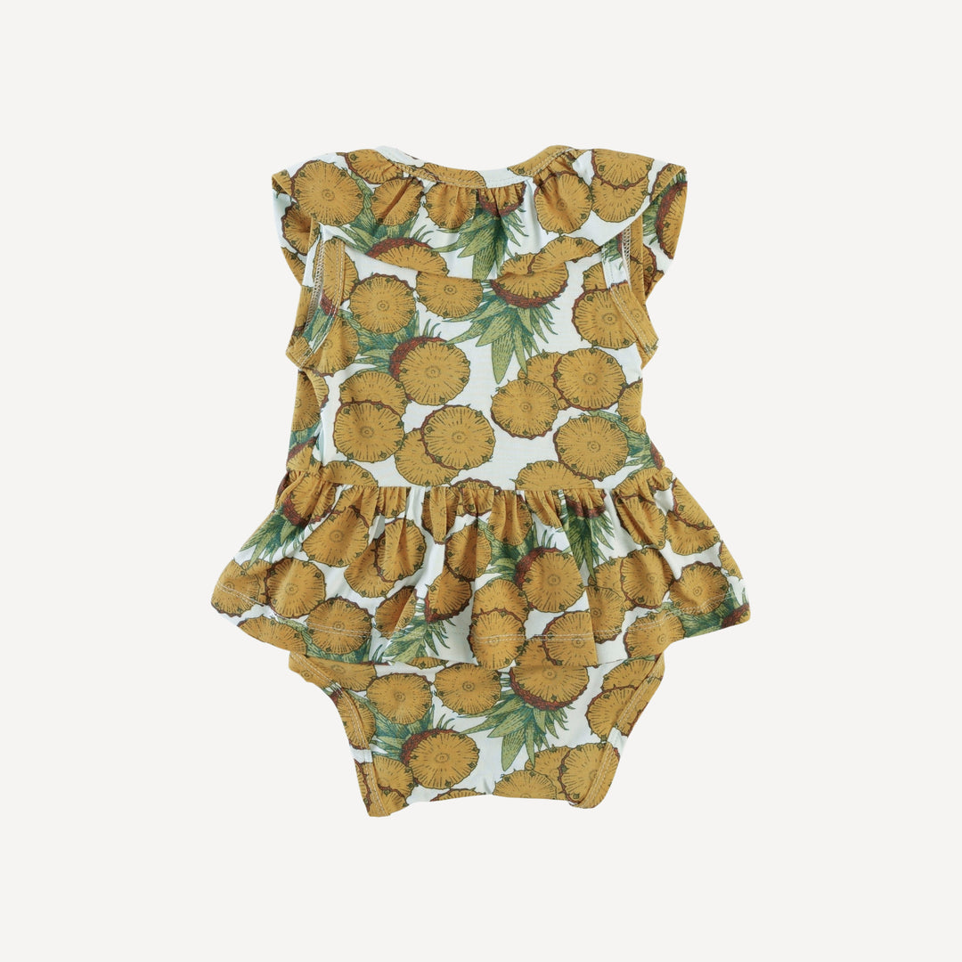 sleeveless ruffle wrap skirted bodysuit | vintage pineapple | bamboo