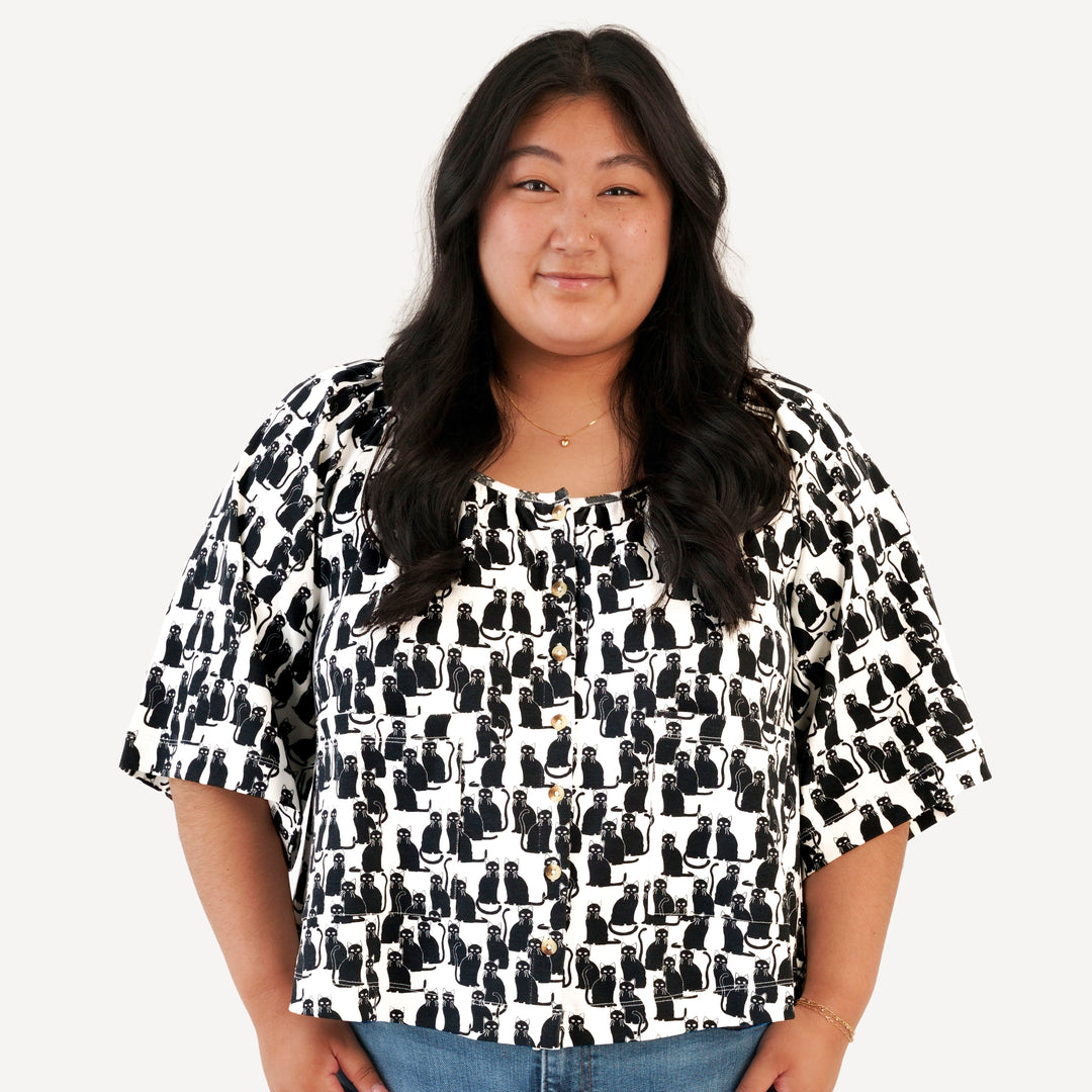 womens pocket button tee | black cats | organic cotton interlock