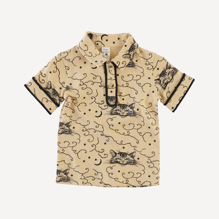 short sleeve piped polo tee | black cheshire cat | organic cotton jersey