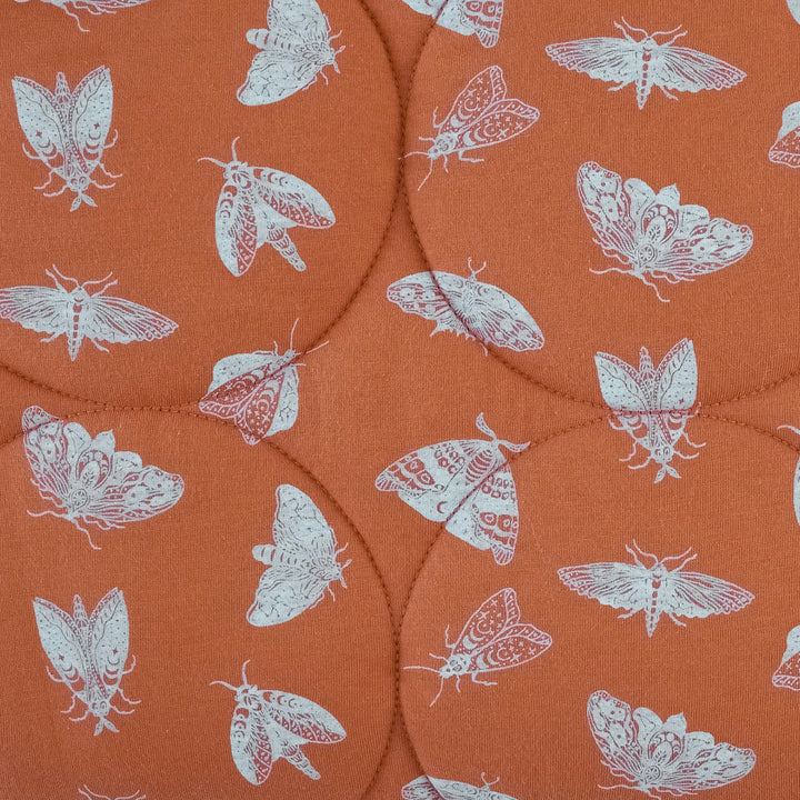 classic circle quilt | spicy moth scatter | organic cotton jersey