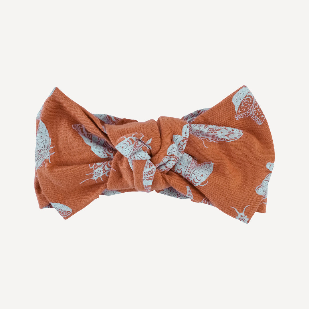 large bow elastic headband | spicy moth scatter | organic cotton jersey