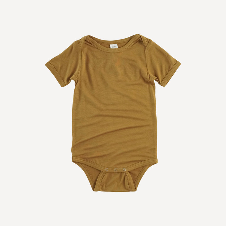 short sleeve lap neck bodysuit | honey mustard | lenzing modal