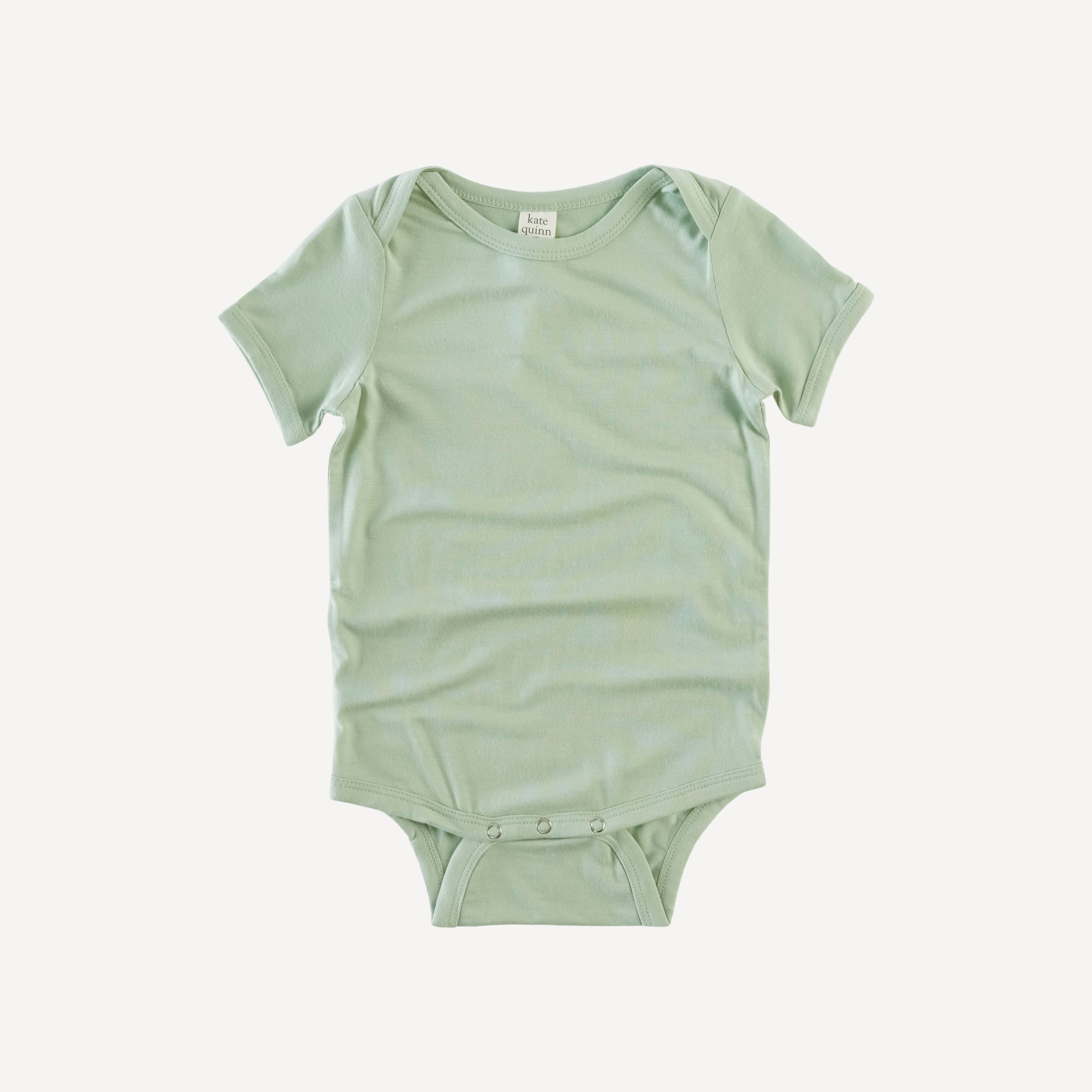 short sleeve lap neck bodysuit | island green | lenzing modal – kate quinn