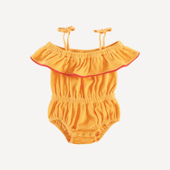 spaghetti tie ruffle off shoulder bubble with pom poms | orange | organic cotton terry