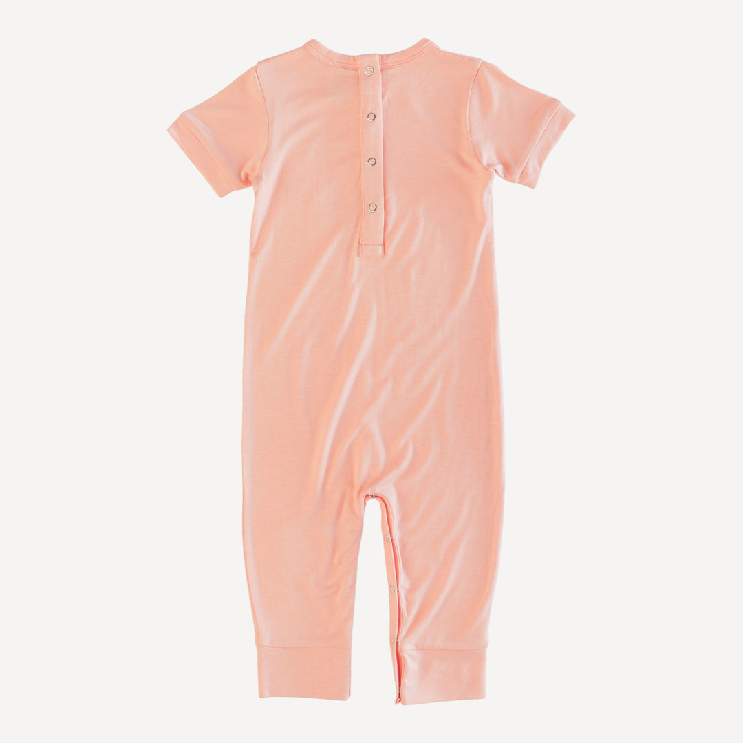 short sleeve piglet sport jumpsuit | pale apricot | bamboo