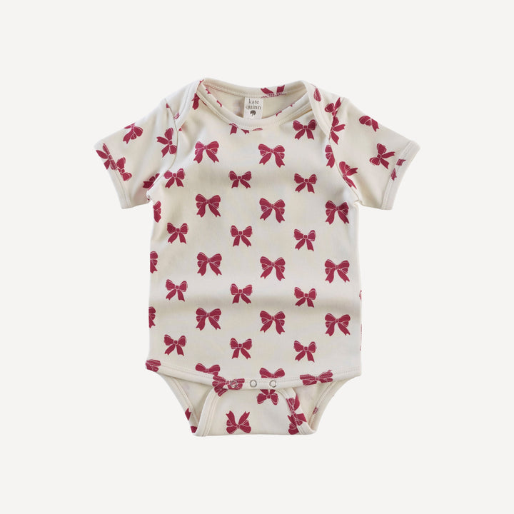 short sleeve lap neck bodysuit | red bow | organic cotton interlock