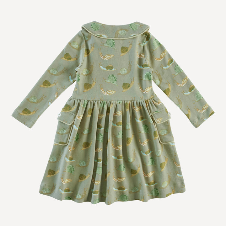 long sleeve peter pan apron dress | snails | organic cotton interlock