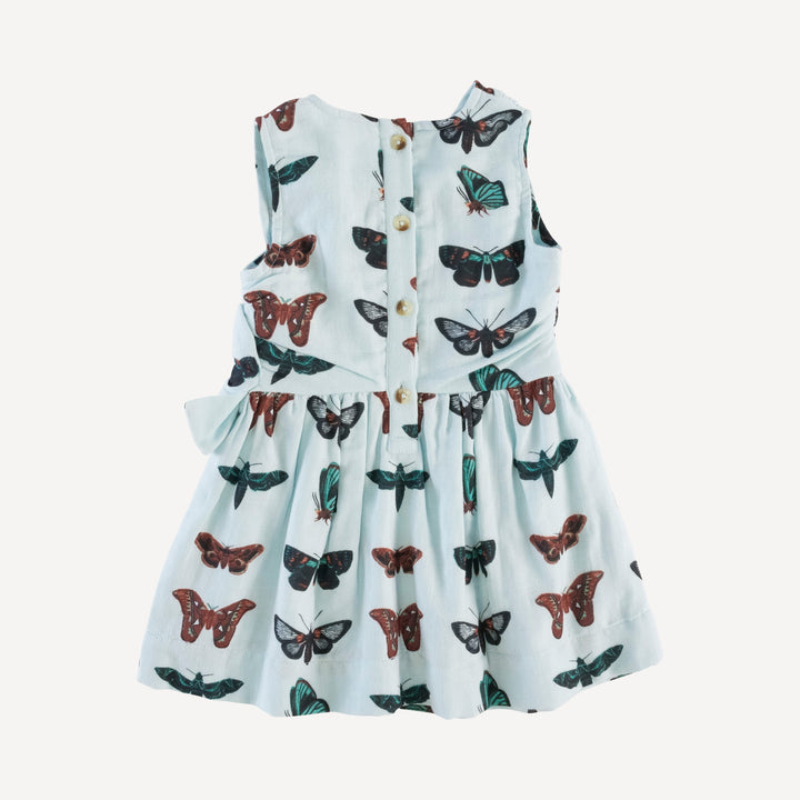 party bow dress | turquoise moths | organic cotton gauze