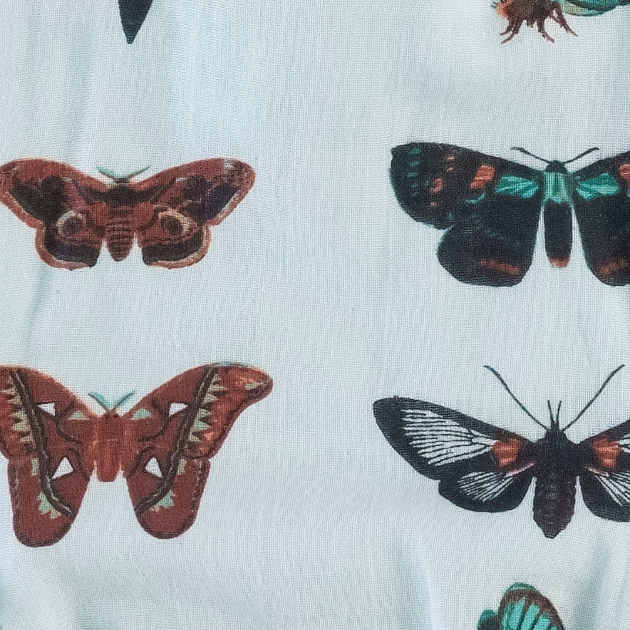 party bow dress | turquoise moths | organic cotton gauze