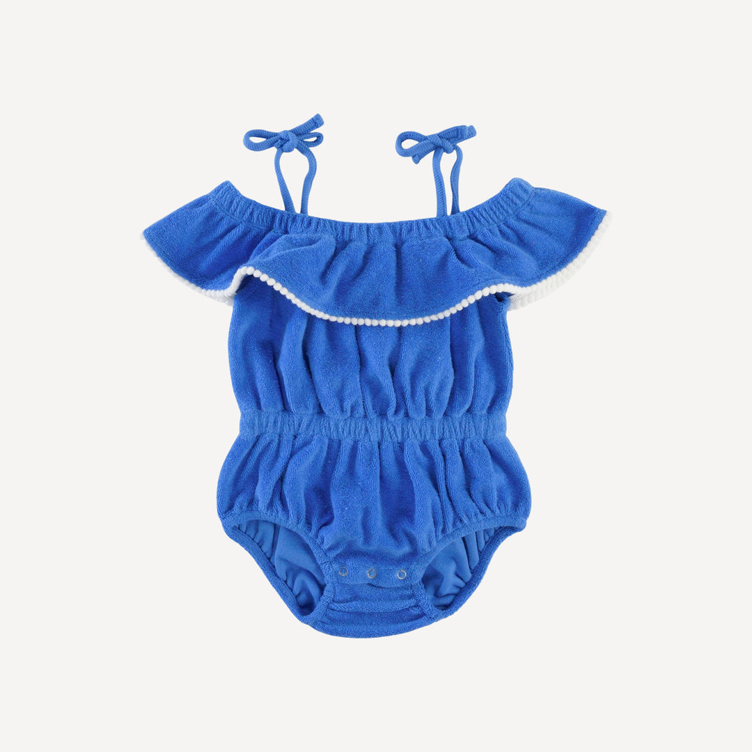 spaghetti tie ruffle off shoulder bubble with pom poms | vivid blue | organic cotton terry